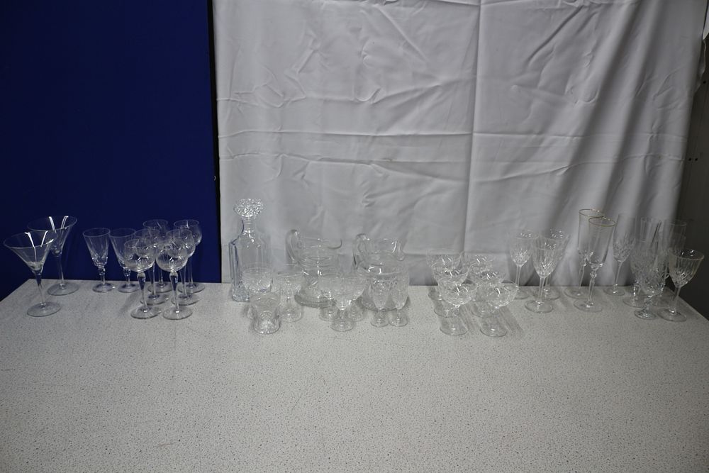 Lot 213: A Collection of Clear Crystal Glass Drinking Vessels and Decanter