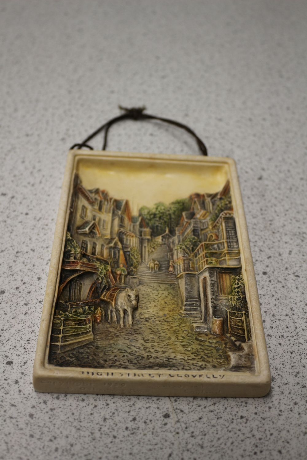 Lot 356: Osborne Ivorex 'High Street Clovelly' Wall Plaque, 1979