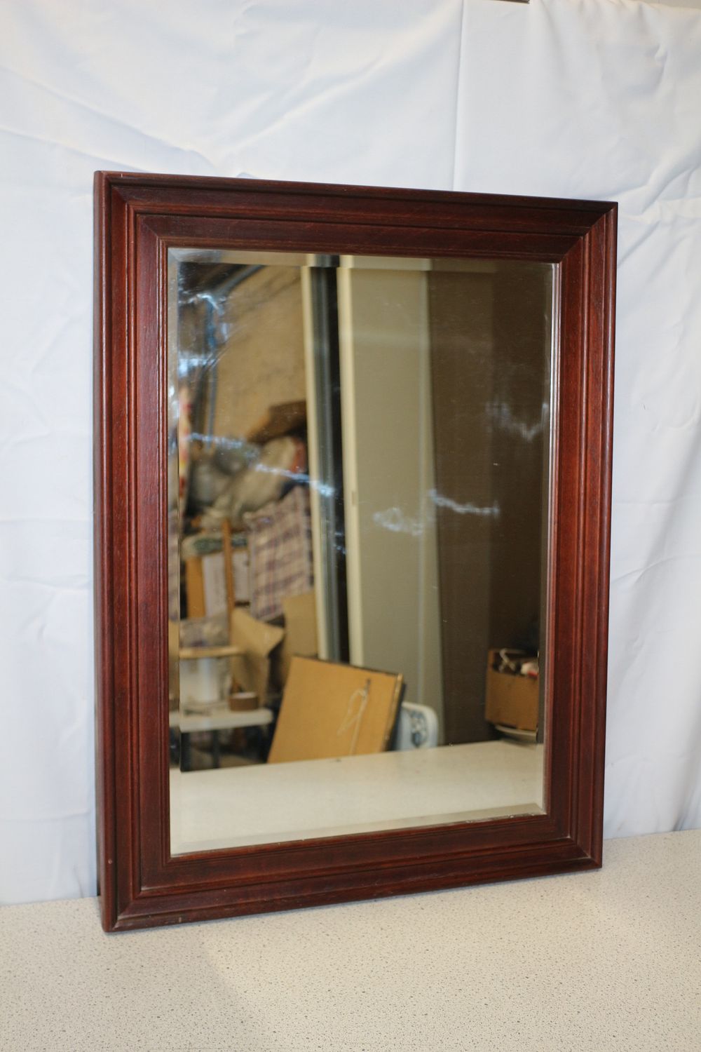 Lot 166: A Rectangular Dark Reddish-Brown Wooden Bevelled Edge Framed Mirror