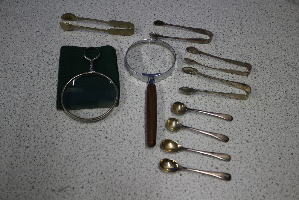Lot 189: A Mixed Lot, Collection of Magnifying Glasses, Tongs, and Spoons