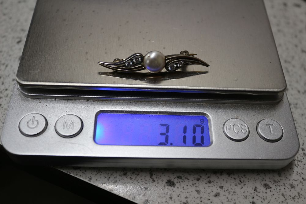 Lot 199: Marked as Silver Pearl and Accent Stone Brooch