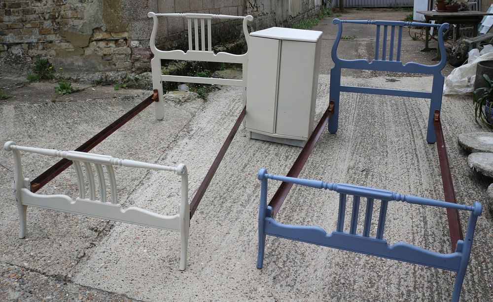Lot 247: Two Single Bed Frames and a Small Cabinet