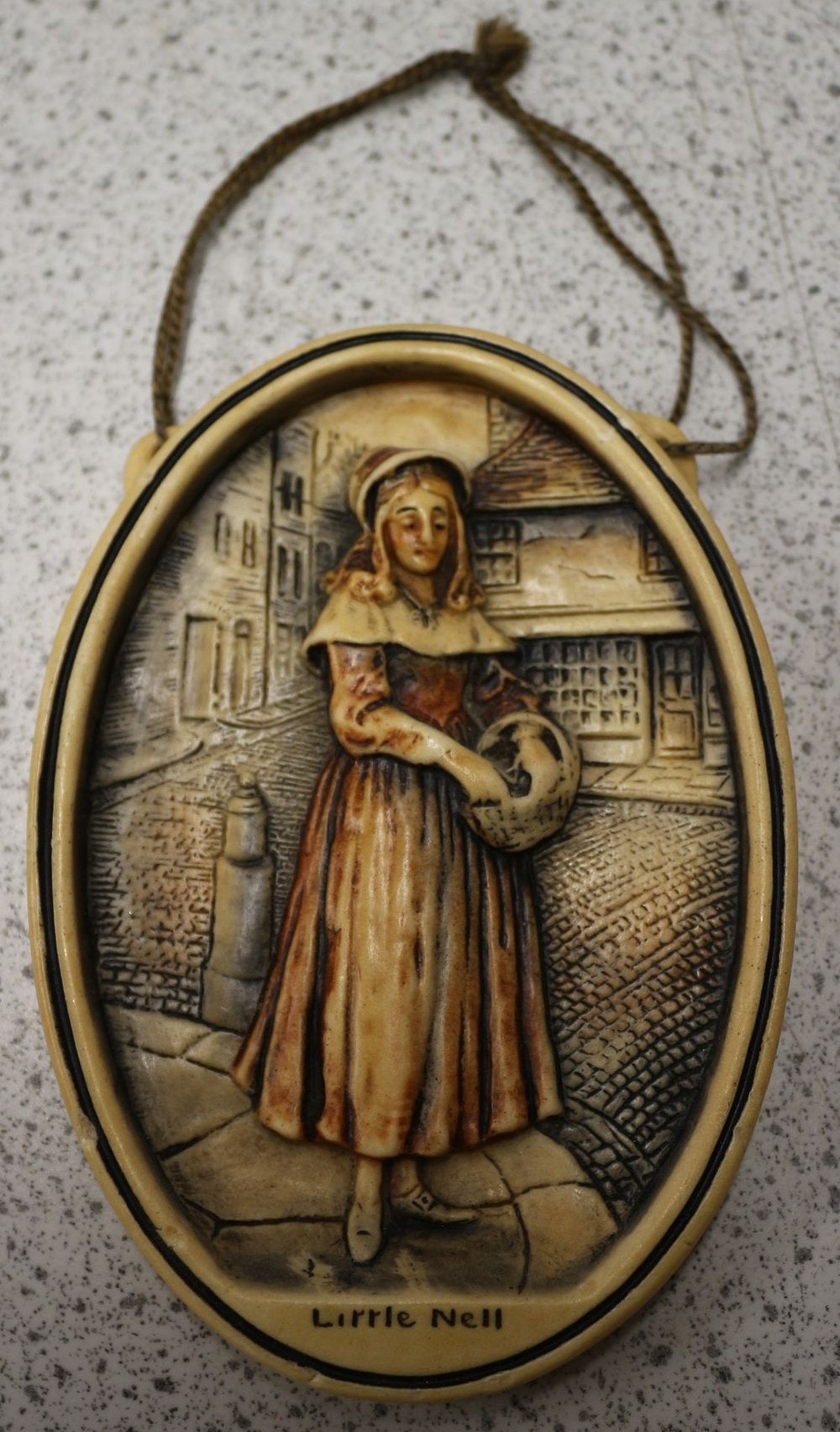 Lot 392: Arthur Osborne Ivorex 'Little Nell' Wall Plaque