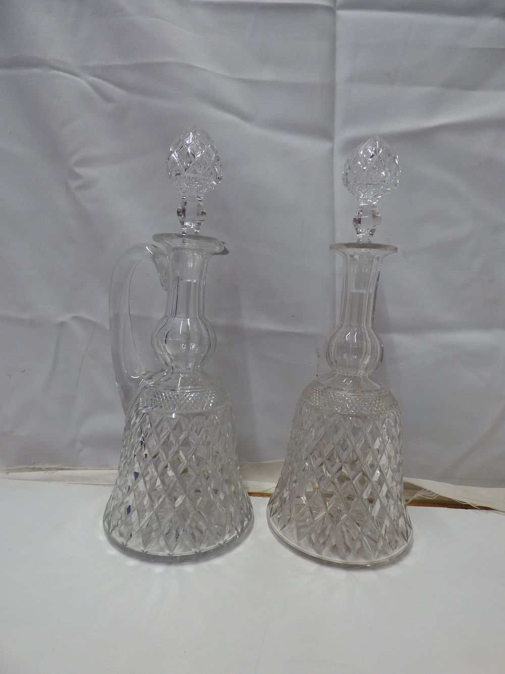 Lot 251: A Pair of Believed to possibly be Baccarat Decanters with Diamond Cut Patterns