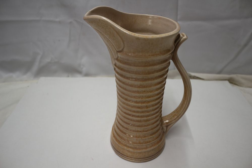 Lot 254: A Speckled Light Brown Govoncraft Art Deco Stoneware Pitcher