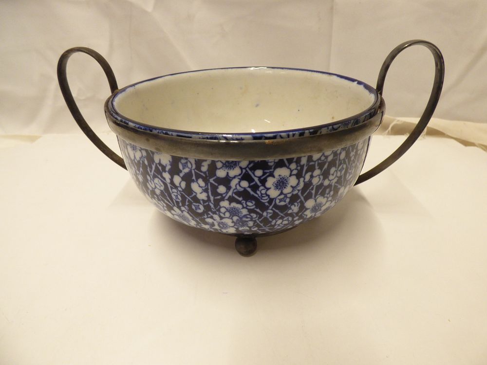 Lot 259: Aged Royal Doulton Blue and White Floral Ceramic Bowl, Set in Metal Frame