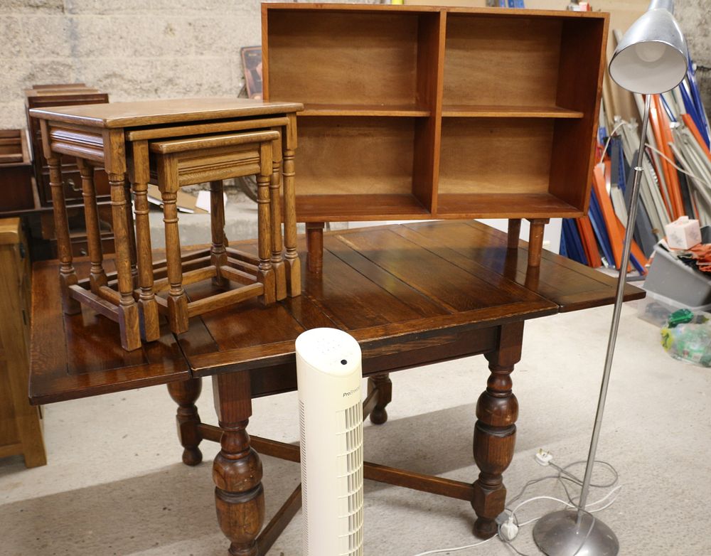 Lot 302: A Collection of Furniture, Dark Wood Dining Table, Nest of Tables, Shelving Unit, ProBreeze Fan, and Floor Lamp