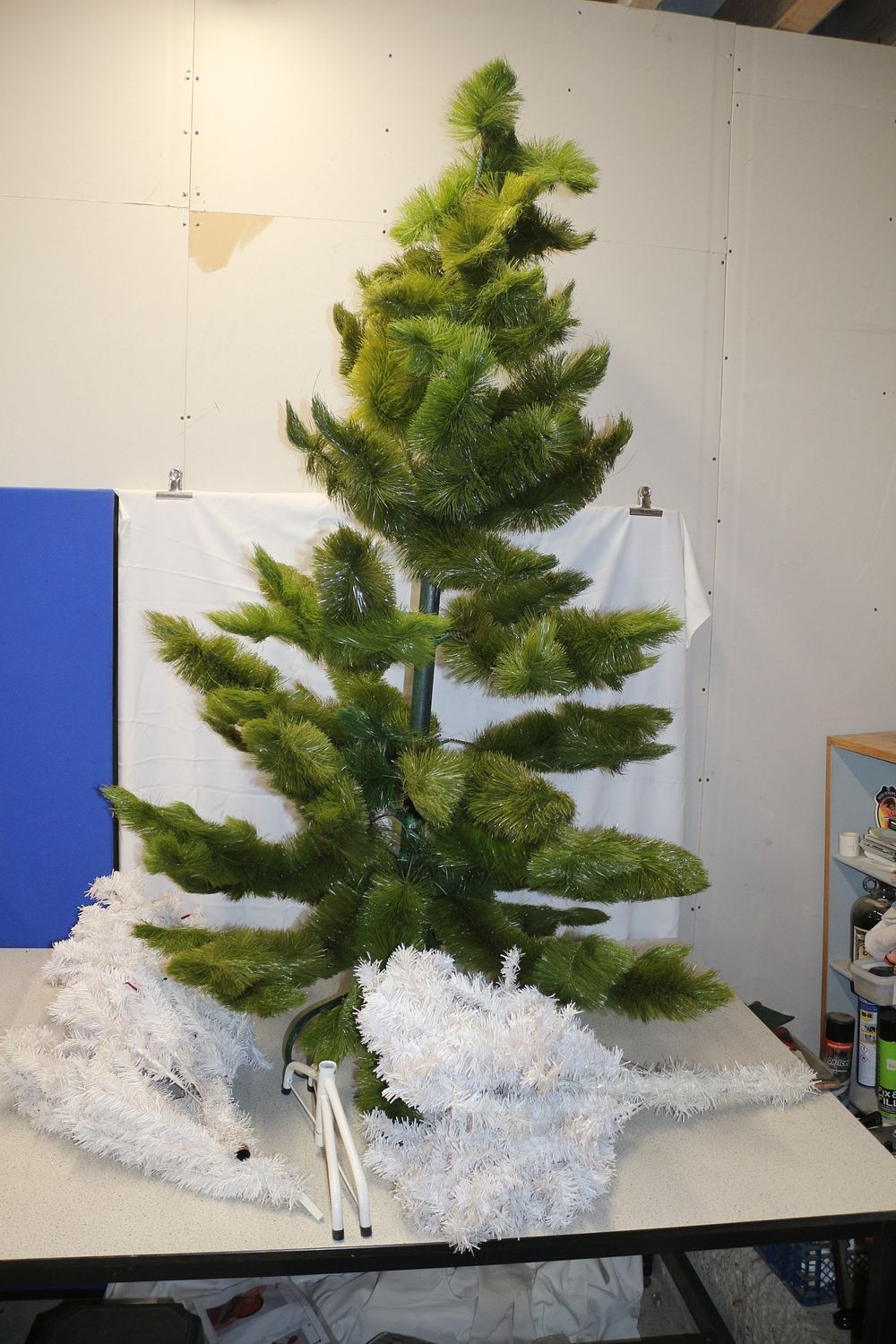 Lot 355: Partially Assembled Artificial Green Christmas Tree with Additional Branches