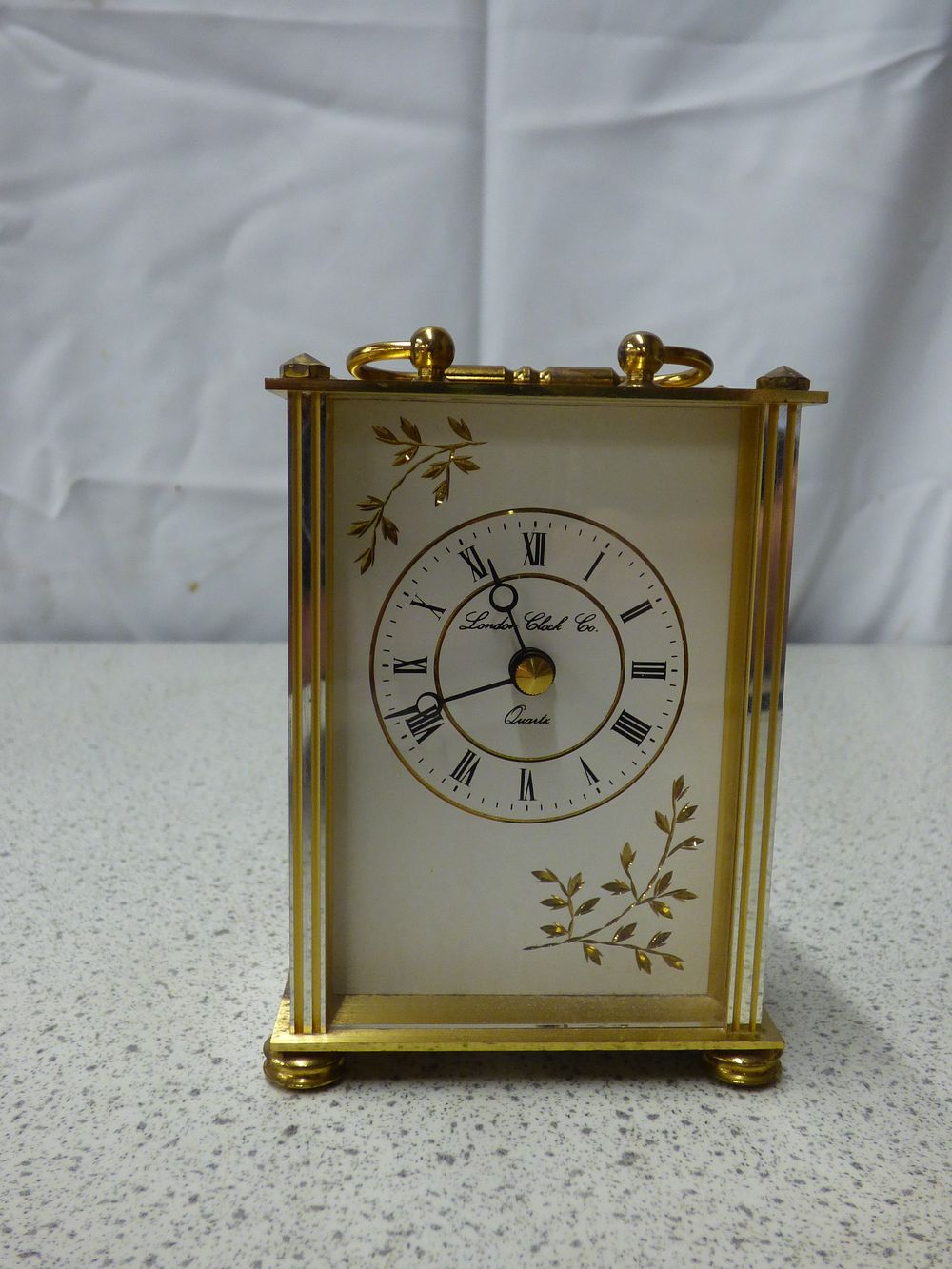 Lot 439: A London Clock Co. Gold-Toned Quartz Carriage Clock