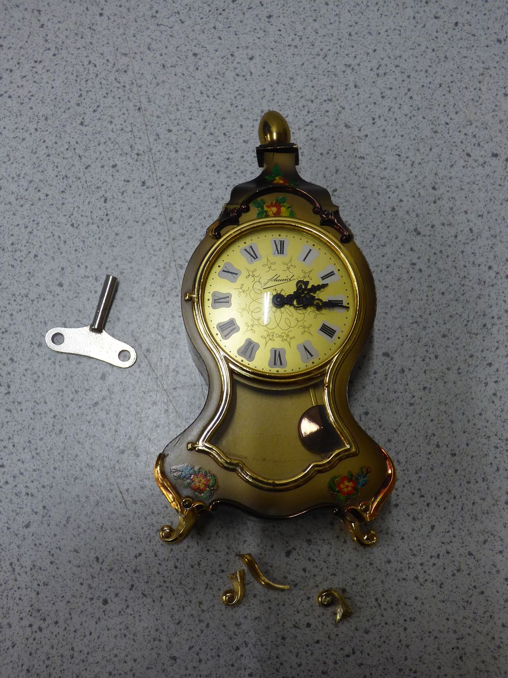 Lot 441: A Johnnid Gold and Bronze-Toned Boule Bracket Clock