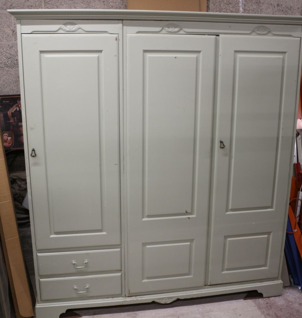 Lot 466: A Jaycee Hand-painted Light Sage Green Three-Door Solid Pine Knockdown Wardrobe with Drawers