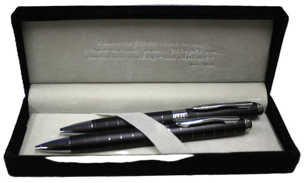 Lot 518: A Cased Set of Two Modern Matte Black Grid Pattern Pens with Biblical Inscription