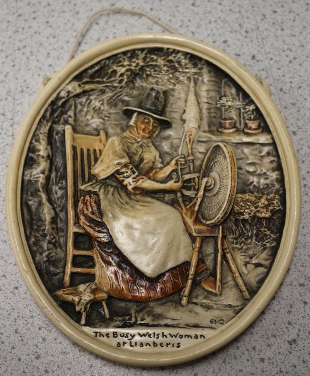 Lot 533: Arthur Osborne Ivorex 'The Busy Welsh Woman of Llanberis' Wall Plaque, circa 1930