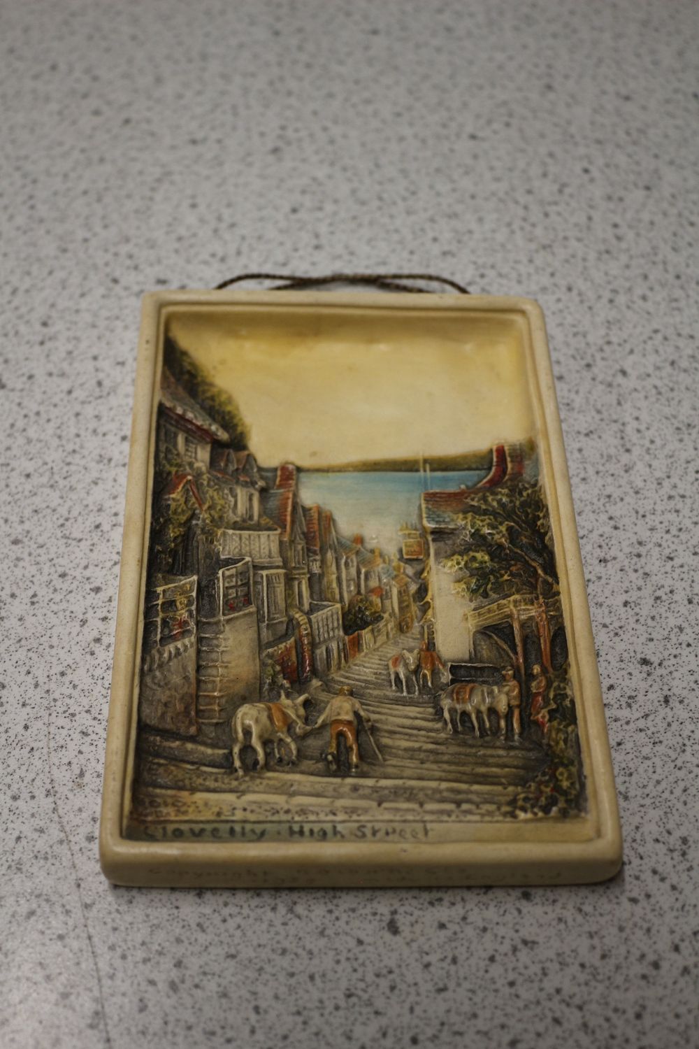 Lot 562: Bossons Ivorex 'Clovelly - High Street' Relief Wall Plaque, dated 1959