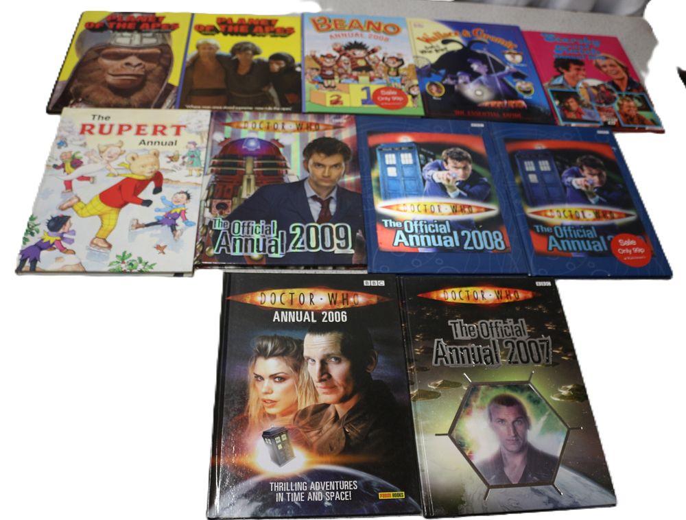 Lot 574: A Collection of Approximately 11 Assorted Hardcover Annuals, including Doctor Who The Official Annuals