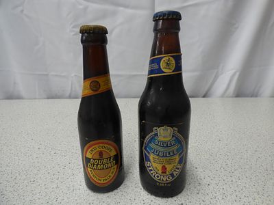 A Pair of Vintage Full Beer Bottles, Ind Coope Double Diamond and Silver Jubilee Ales. A pair of 