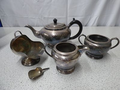 A Five-Piece Silver-Plated Tea Set. A five-piece silver-coloured tea set, comprising a teapot 