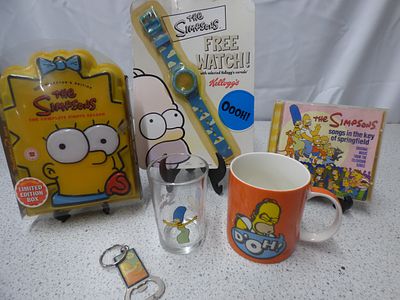 A Collection of The Simpsons Memorabilia. A collection of six The Simpsons items, featuring a 