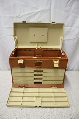 Vintage Plano 757 Plastic Fishing Tackle Box. A brown and beige plastic Plano tackle box, Model 