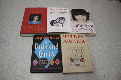 A Collection of Five Signed Hardcover Books. Five hardcover books including 'Monica's Story' 