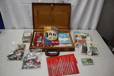 Collection of Vintage Knitting Crochet Patterns & Craft Notions. A brown leather briefcase 