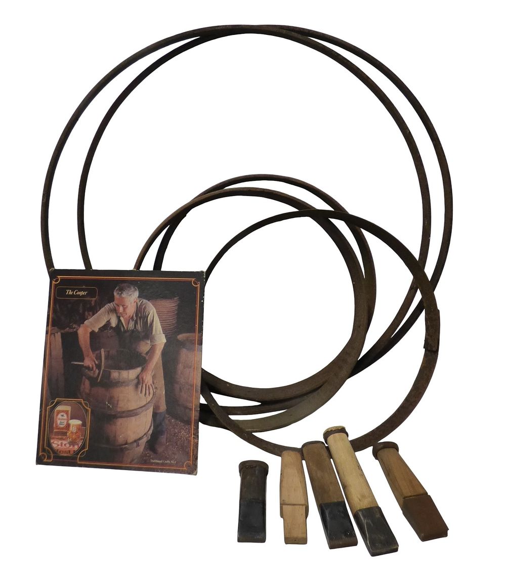 Lot 227: A Collection of Barrel Hoops, Cooperage Tools, and 'The Cooper' Print