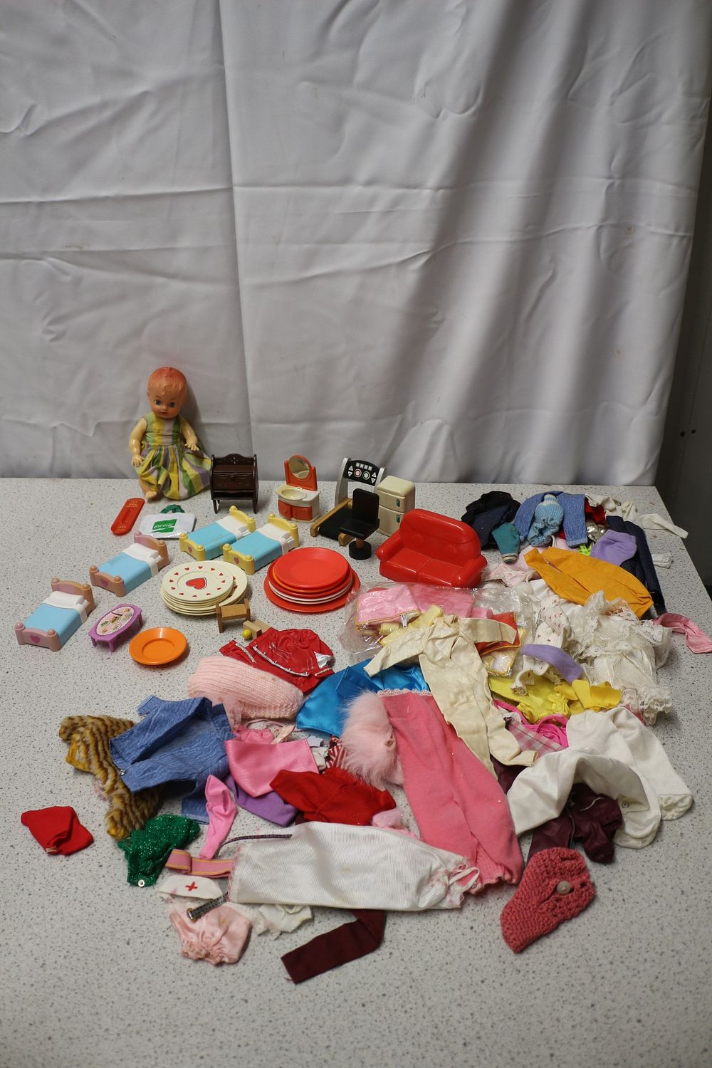 Lot 214: A Collection of Vintage Doll, Clothes, and Furniture