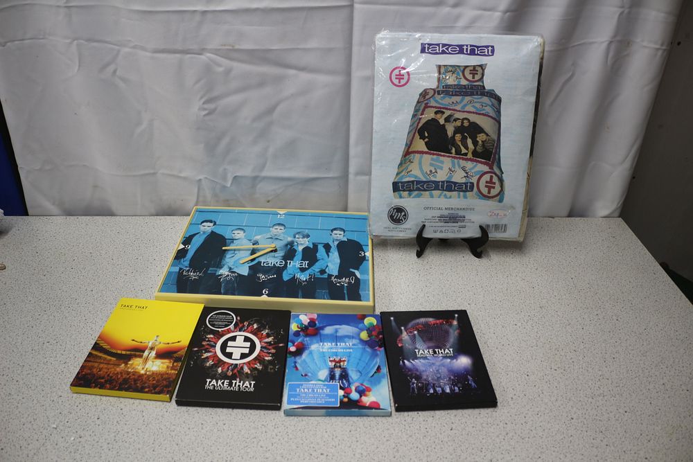 Lot 219: A Collection of Take That Official Merchandise and Media
