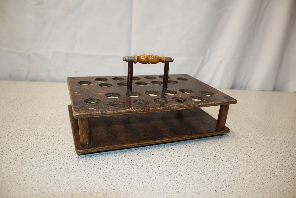 Lot 234: A Vintage Dark Brown Wooden Communion Tray or Test Tube Rack with Handle