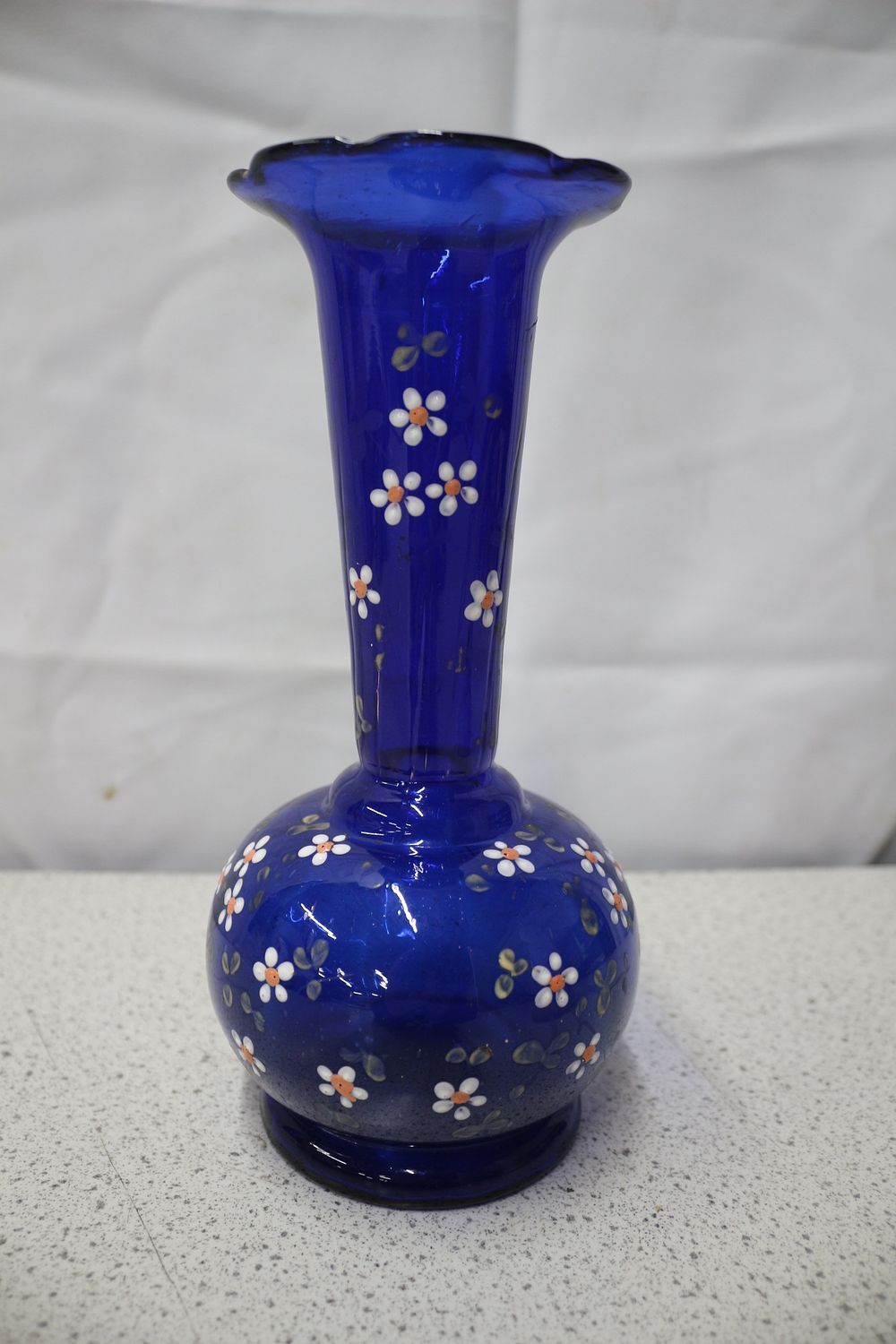 Lot 237: A Victorian Bristol Blue Enamel Hand Decorated Glass Vase