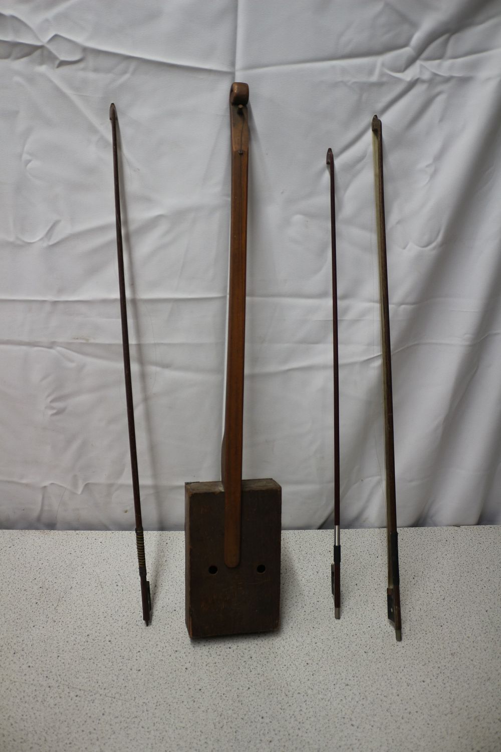 Lot 257: Scratch Built Musical Instruments. Folk-Style One-String Fiddle and Three Bows