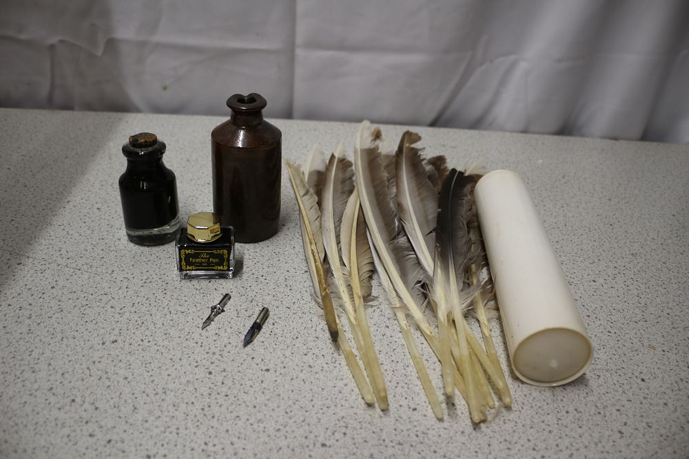 Lot 266: A Collection of Vintage Calligraphy Writing Supplies with Ink and Quills