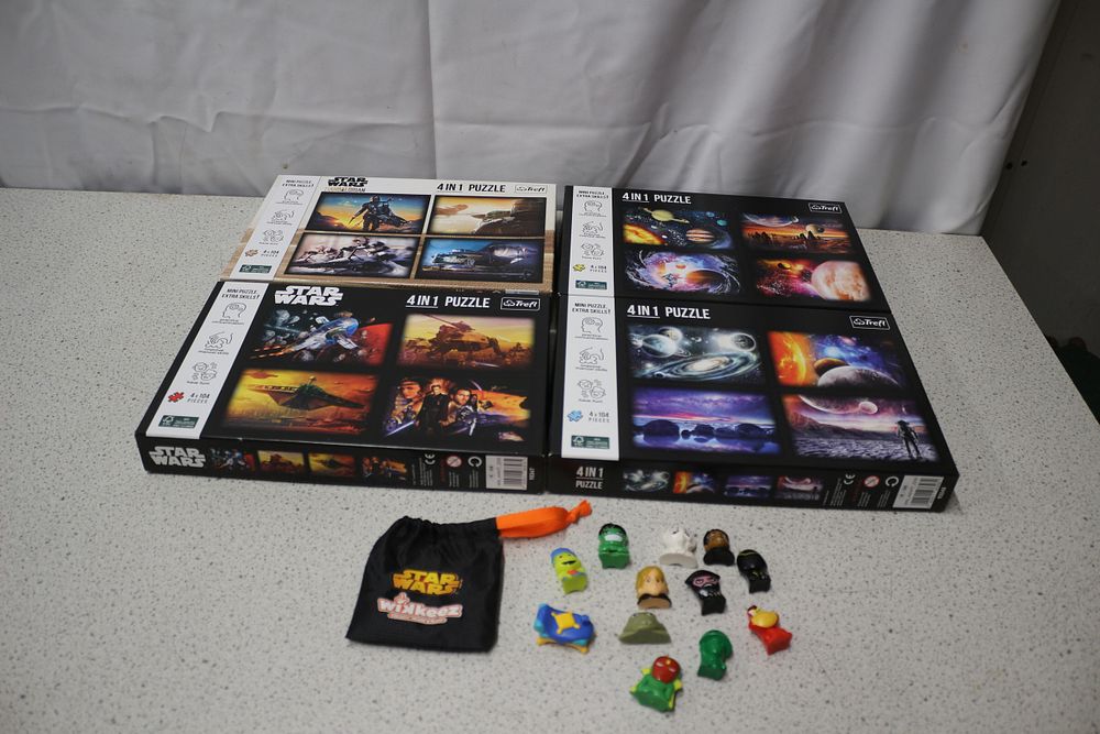 Lot 283: A Set of Four Star Wars Trefl Puzzles and Wikkeez Figures