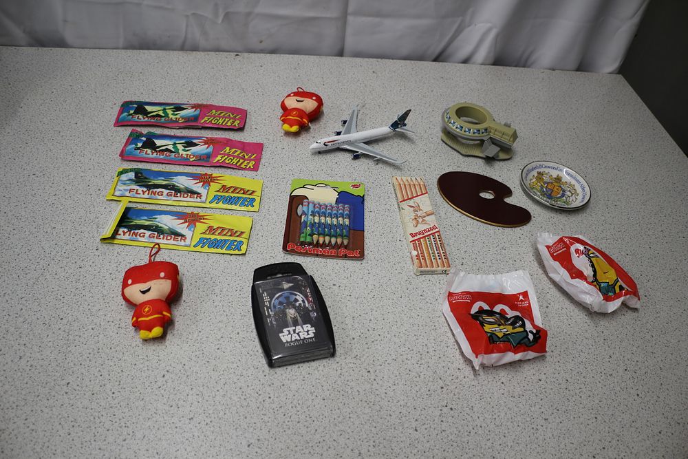 Lot 338: Collection of Toys Including One Top Trumps Star Wars Rogue One Card Pack, Gliders and more