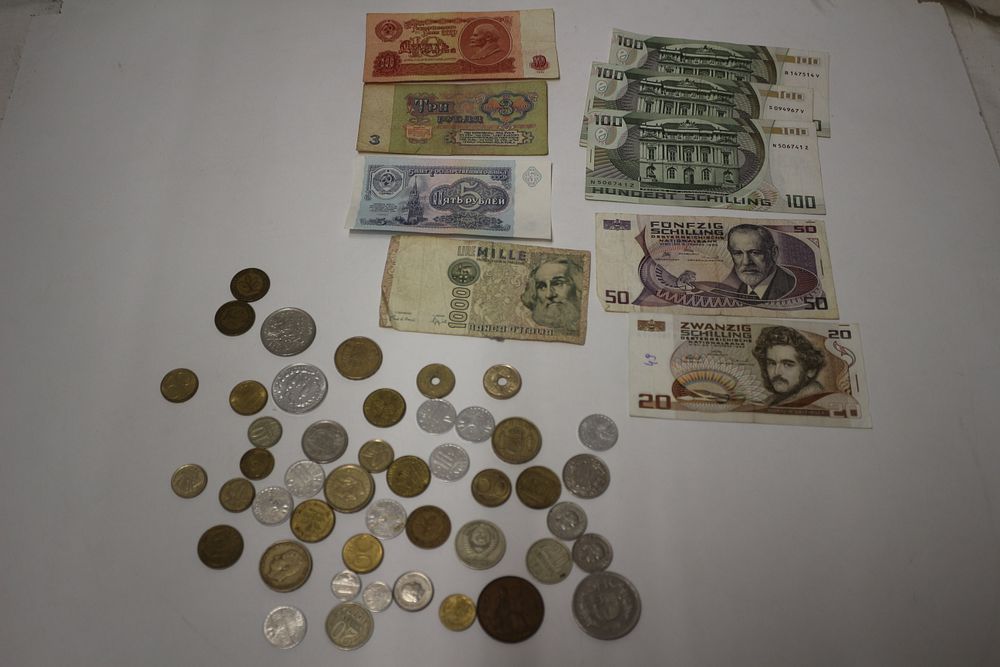Lot 363: Collection of Foreign Currency, Soviet, Austrian, and Italian Banknotes with Coins