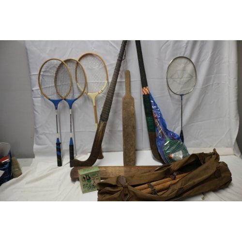 Lot 364: A Collection of Vintage Sports Equipment including Rackets and Bats