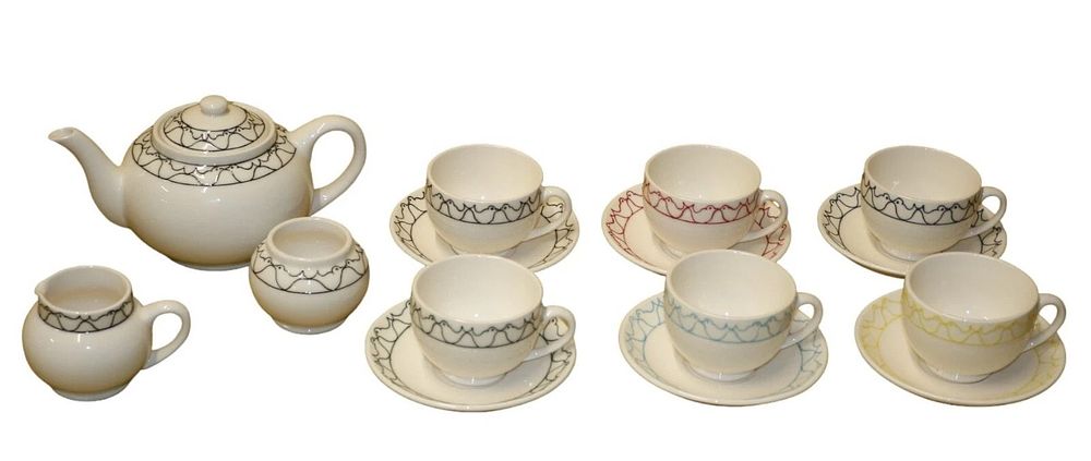 Lot 475: A Moorcroft 'Trial' Ceramic Tea Service with Stylized Bird Pattern