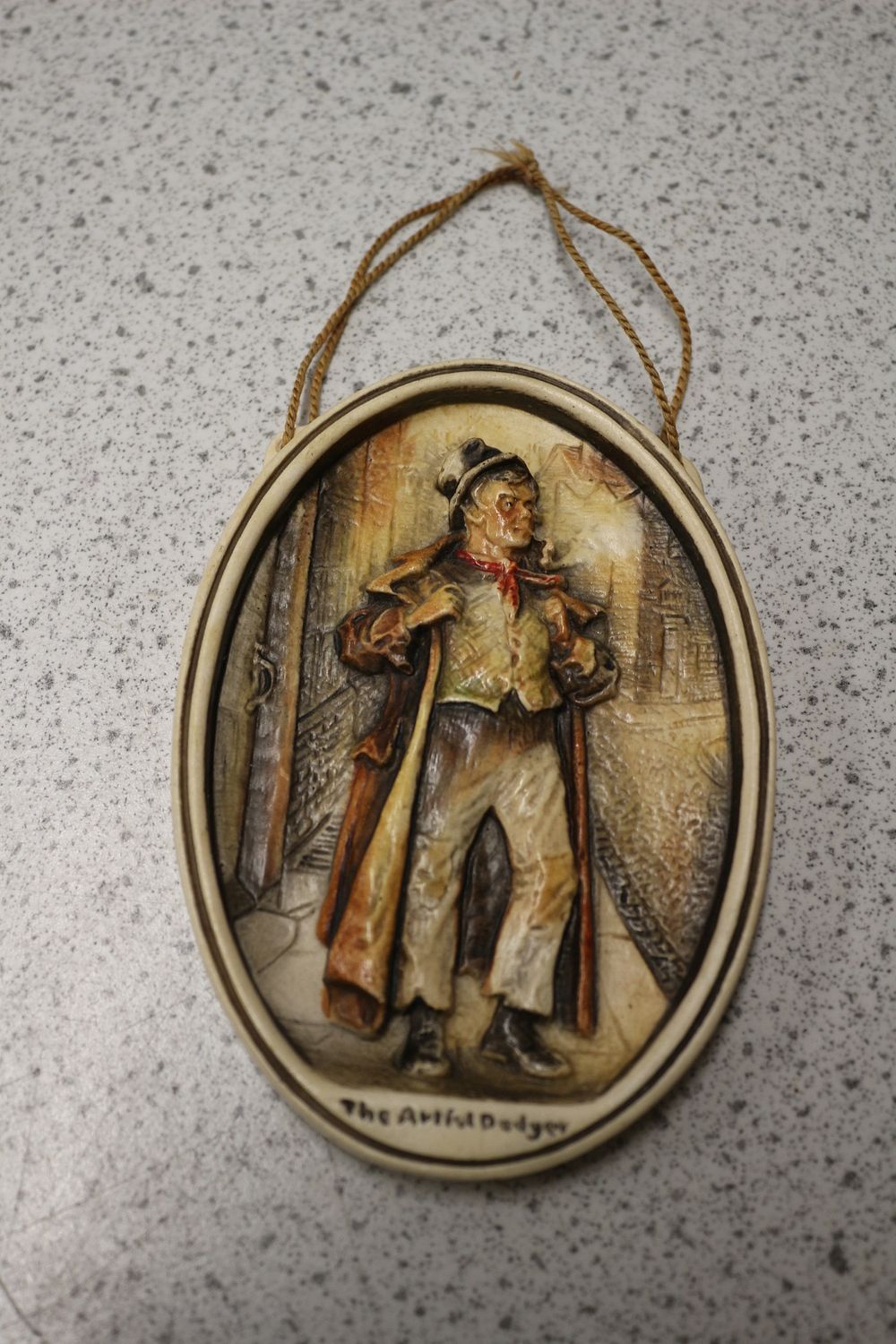 Lot 537: Osborne Ivorex 'The Artful Dodger' Relief Wall Plaque