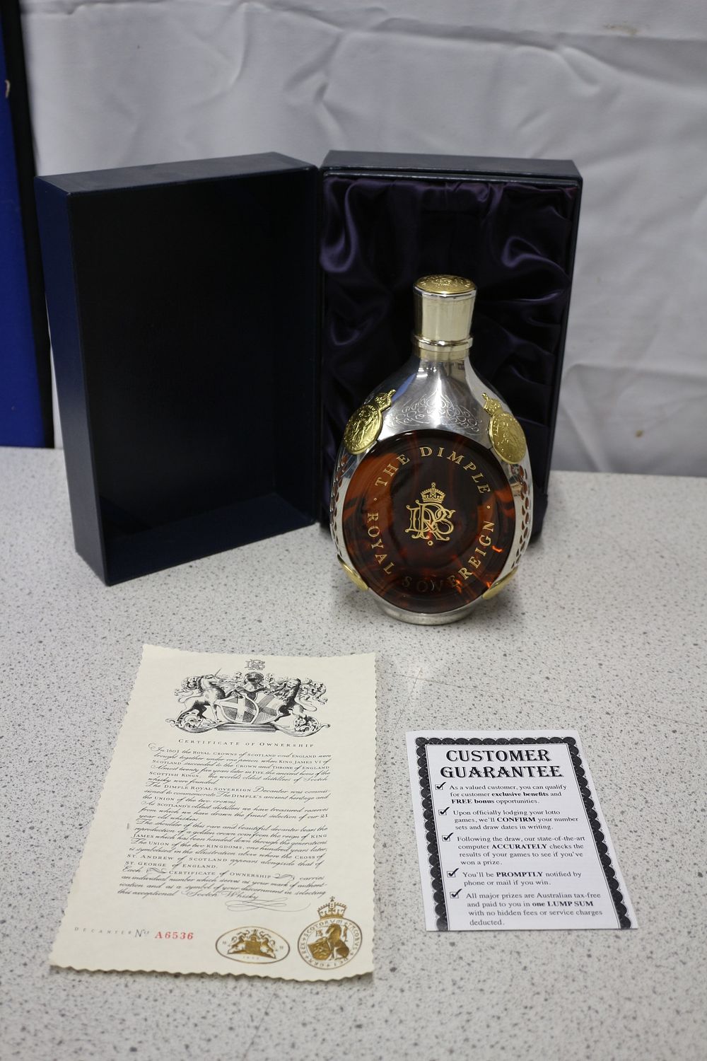 Lot 581: A Rare Dimple Royal Sovereign 21 Year Old Scotch Whisky Decanter