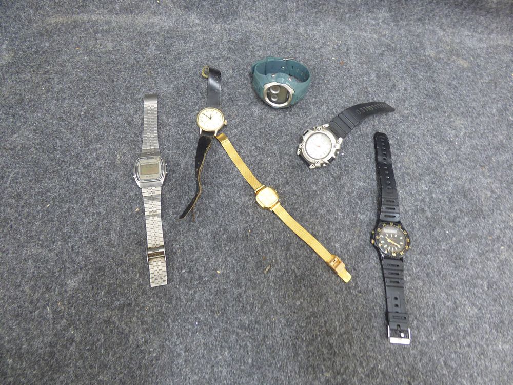 Lot 222: A Collection of Assorted Digital and Analog Wristwatches