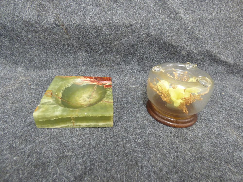 Lot 236: Two Ashtrays Including Stone and Floral Lucite Examples
