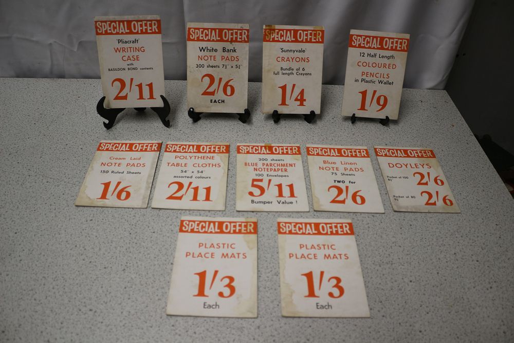 Lot 332: A Collection of Vintage Store Sale Signs