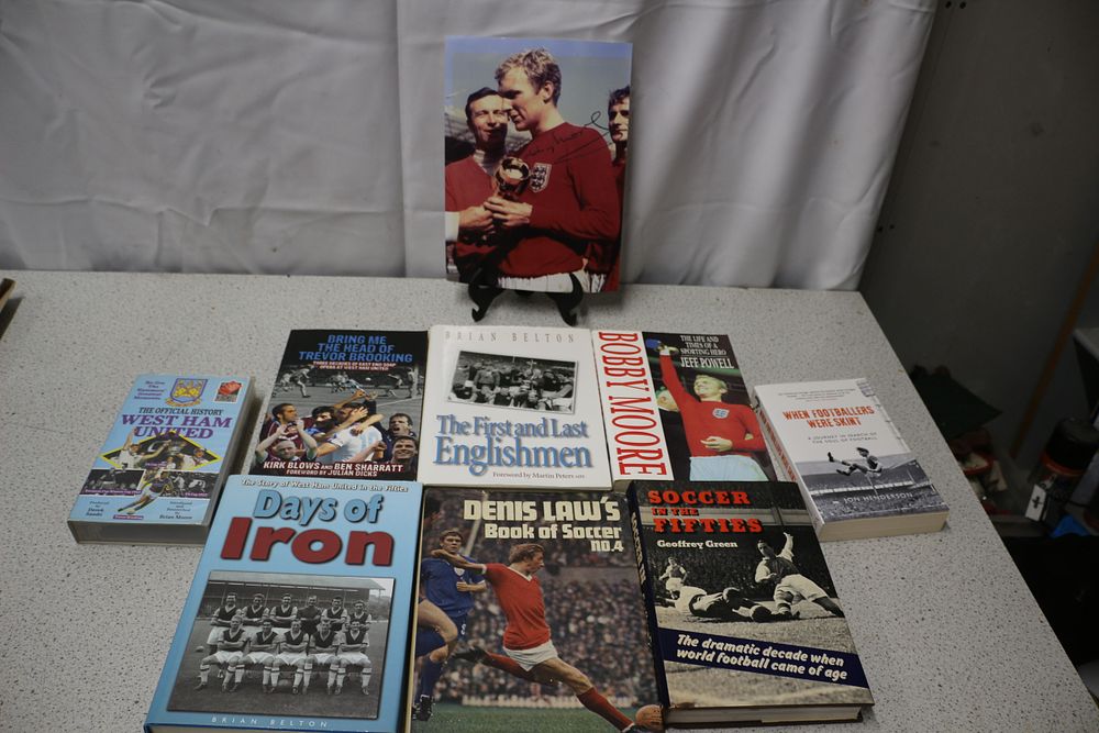 Lot 339: Bobby Moore Signed Photo and Collection of Football Books