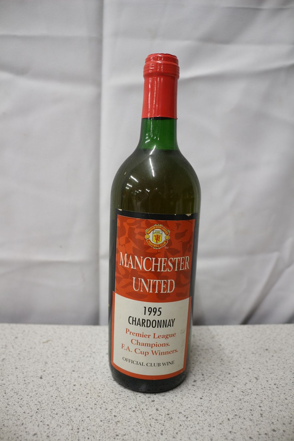 Lot 444: A Manchester United 1995 Chardonnay Wine Bottle