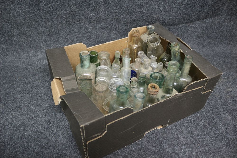 Lot 228: A Collection of Vintage Glass Bottles