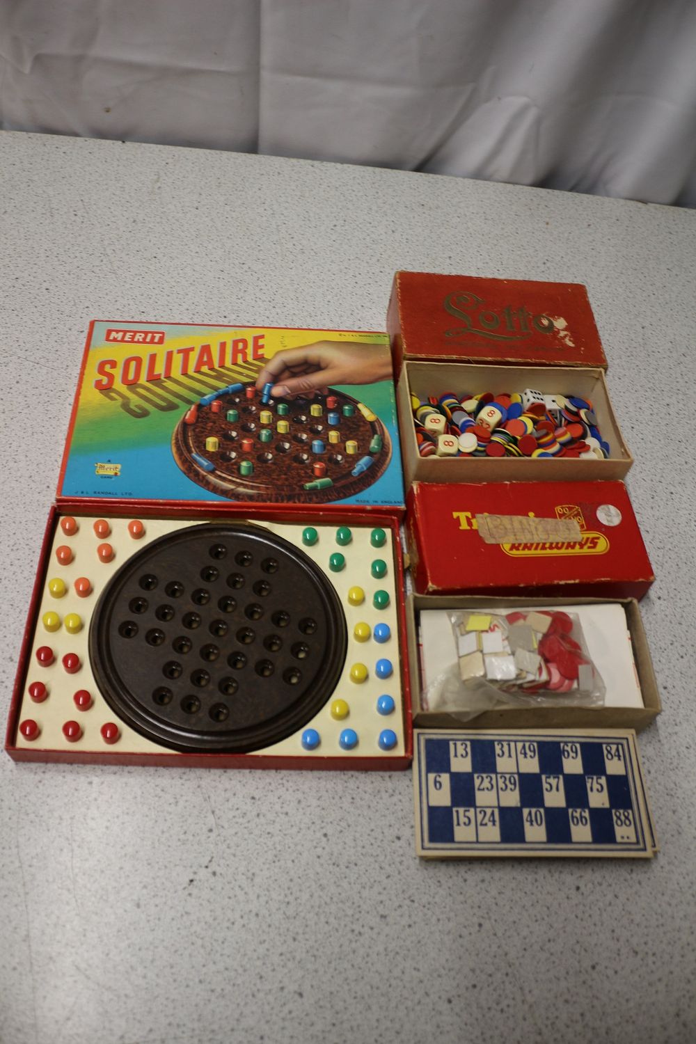 Lot 273: A Collection of Vintage Board Games including Merit Solitaire by J&L Randall