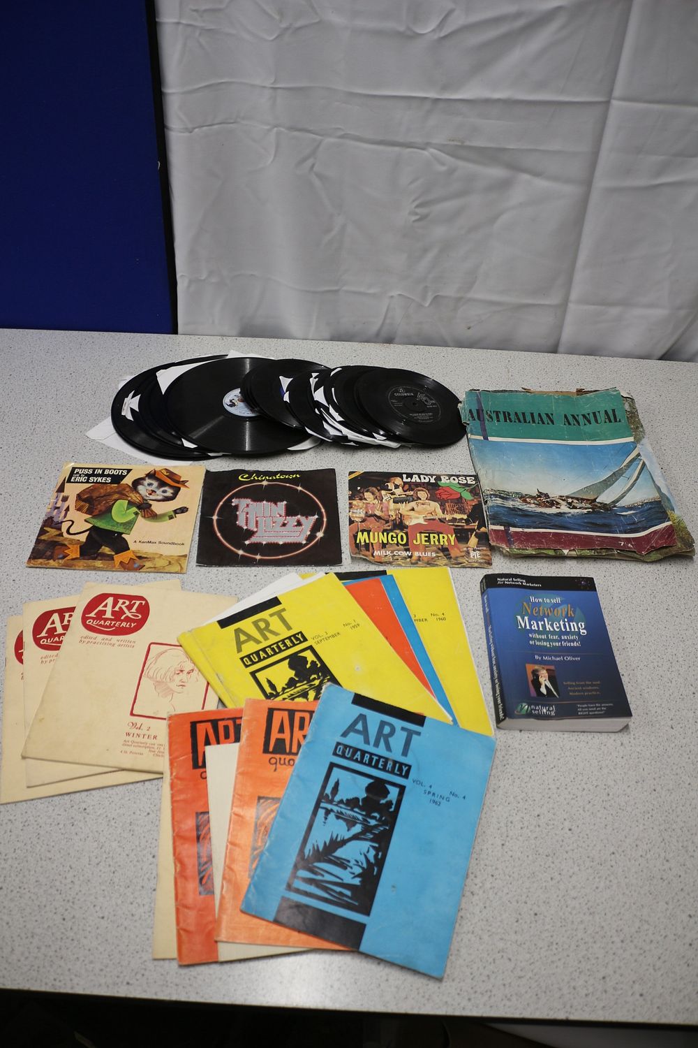 Lot 551: A Collection of Mid-20th Century Vinyl Records, Magazines, and Books