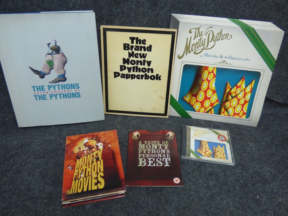 Lot 219: A Collection of Monty Python Books Vinyl and Media