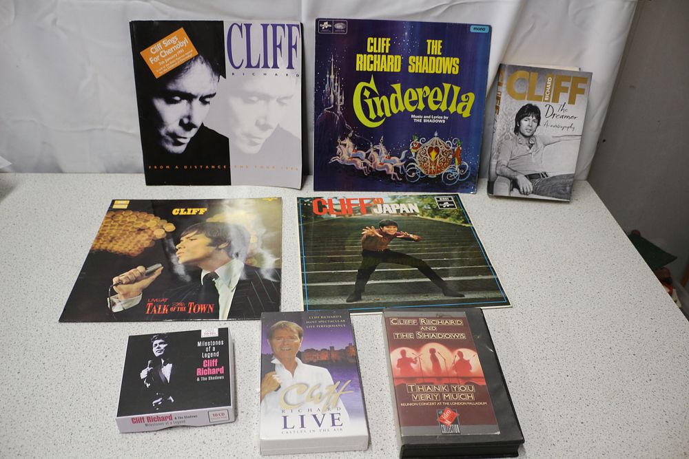 Lot 321: A Collection of Cliff Richard Albums, Book, and Videos