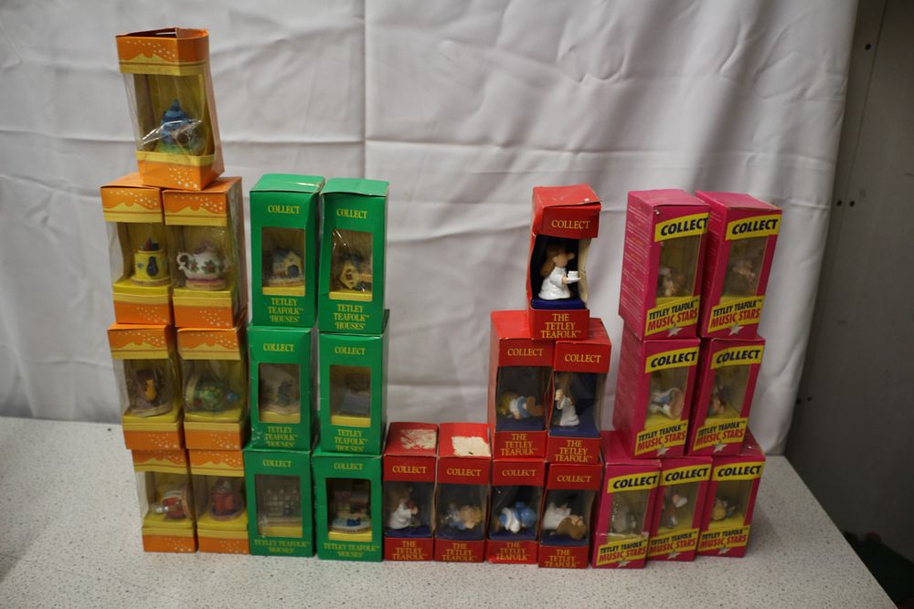 Lot 305: A Collection of Tetley Teafolk Miniature Figurines and Houses